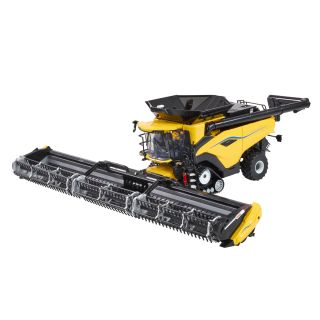 🚜 New Holland CR11 Do naší nabídky dorazil kombajn New Holland CR11 v měřítku 1:32 od značky Britains! Součástí balení...